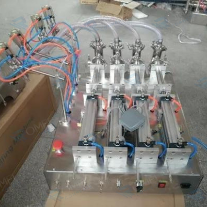 LLENADORA SEMIAUTOMATICA DE LIQUIDOS POR SUCCION  4 BOQUILAS DE 5 A 50ML Ó 10 A 100ML